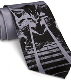 Silver laser cat necktie.