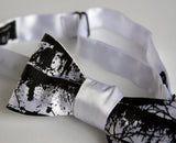 Black ink on white bow tie.