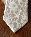Boudoir Lace print necktie, by Cyberoptix. Ivory-cream on cream silk.
