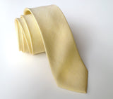 butter yellow linen + silk blend woven necktie.