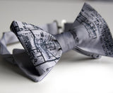  Navy ink on a silver bow tie.