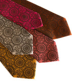 Chocolate brown ink on mustard, champagne, fuchsia microfiber.