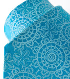 Light sky ink on turquoise silk.