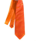 Dark coral ink on pumpkin silk.