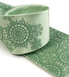 Clover ink on apple green silk.