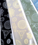 Diatoms Necktie: Silver ink on black, ivory-cream ink on platinum, ice ink on seafoam and sky blue.