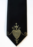 Gold ink on narrow black tie.
