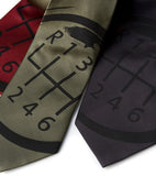 Gear shift necktie, black on burgundy, olive, charcoal.