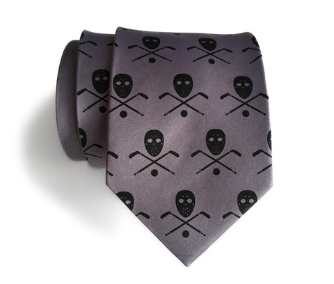 Hockey necktie. Stick, mask & puck print.