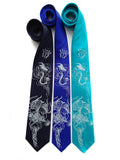 Jellyfish neckties, by cyberoptix. Ice blue ink on navy, royal blue, turquoise.