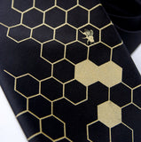 Gold and black Beehive necktie.
