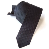 Skinny black perforated leather tie.