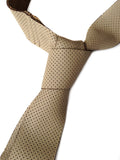 Perforated Tan Leather Necktie, tied. By Cyberoptix.