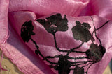  Black ink on pink silk scarf.