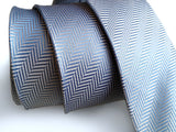 light blue woven herringbone silk necktie