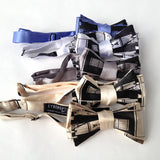 Black ink on champagne, cream, silver, white, blue aster.