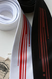 Red ink on white, black narrow tie.