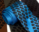 Tire Tread Necktie. Black on electric blue.