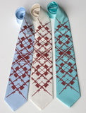 Crimson ink on sky blue, cream, aqua.