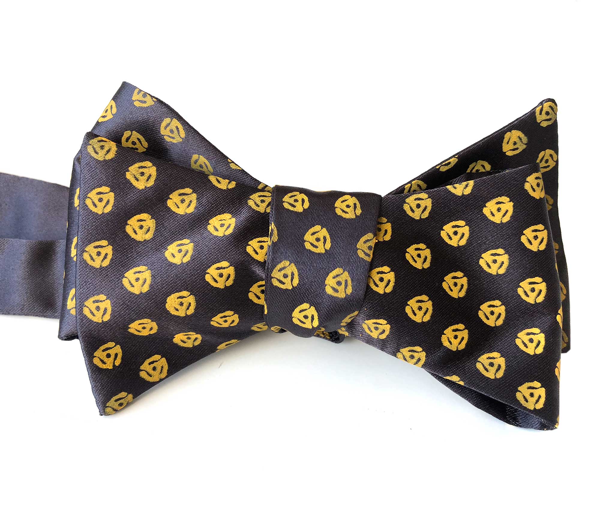 black tie with gold polka dots