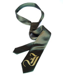 Old English Blackletter monogram tie - gold ink on olive.