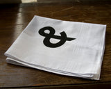  Black ink on white cotton handkerchief.