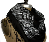 White ink on black pashmina.