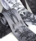 Beer Neckties, by Cyberoptix. Dark gray ink on silver, white