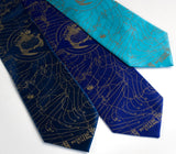 Bermuda Triangle Neckties. Antique brass on french blue, royal blue and turquoise silk