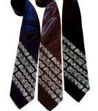 Bike Chain Stripe Neckties. Dove grey on navy, charcoal, black.