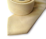 butter yellow linen + silk blend woven necktie.