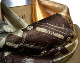 Chocolate ink on olive ombre silk scarf.