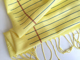 Lined paper scarf: butter.