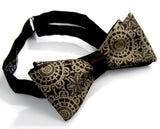  Antique brass ink on a black bow tie.
