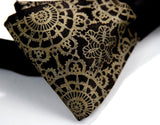  Antique brass ink on a black bow tie.