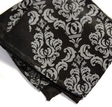 Damask pocket square: dove grey on black.