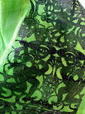 Black ink on lime silk scarf.