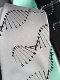 DNA necktie: silver print on black.