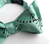 DNA bow tie: Black on mint.