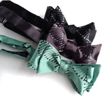 DNA bow tie: mint, charcoal, and black.