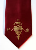 Gold ink on burgundy tie.