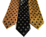 Fleur de lis ties. L to R: Honey; black; gold.