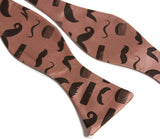  Espresso brown ink on pale copper bow tie.