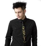 Gold ink on skinny black tie.