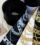 Silver ink on black, gold ink on white and black skinny ties.