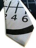 Gear Shift silk tie: black on silver.