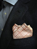 Graph Paper pocket square: dark salmon on cream.
