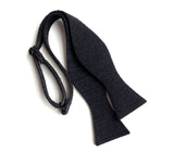 Black industrial felt bow tie, untied. By Cyberoptix.