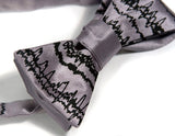 Black on silver bow tie.