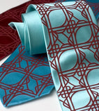 Crimson ink on aqua, crimson, turquoise. Standard width silk.